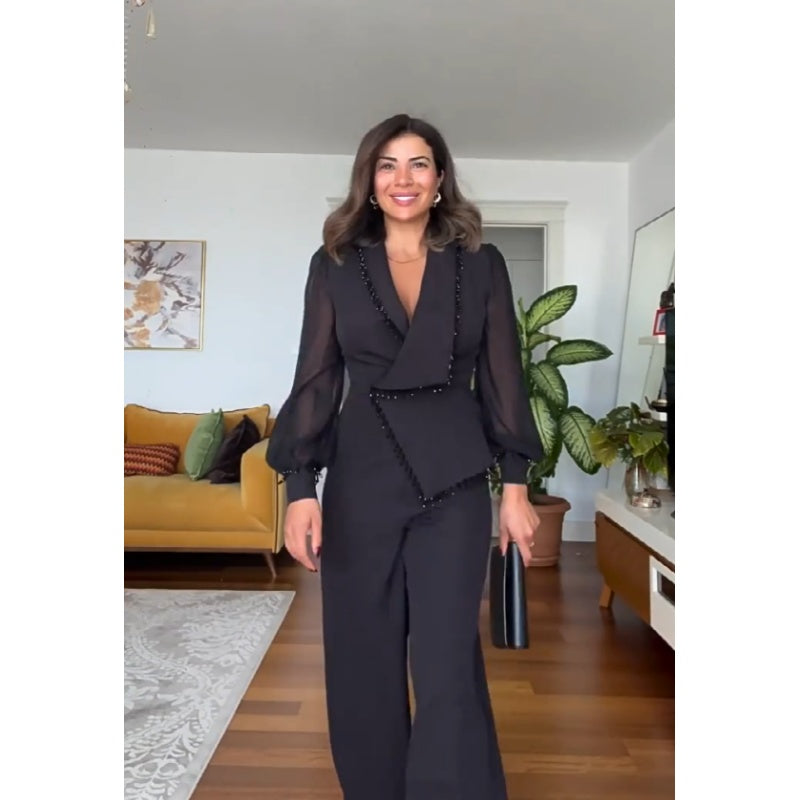 LINA - Jumpsuit noire élégante avec jambes larges et perles