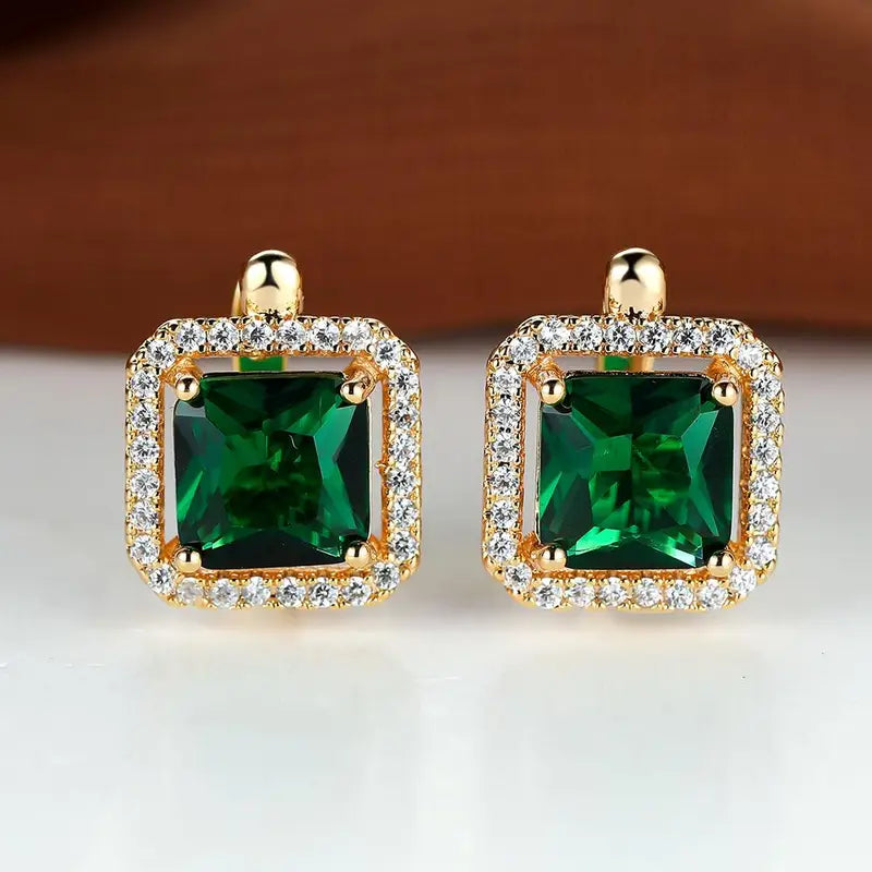 Boucles d'oreilles avec zircons carrés vert doré | Or