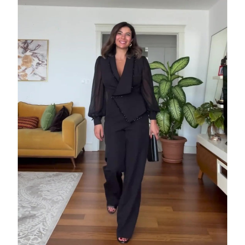 LINA - Jumpsuit noire élégante avec jambes larges et perles